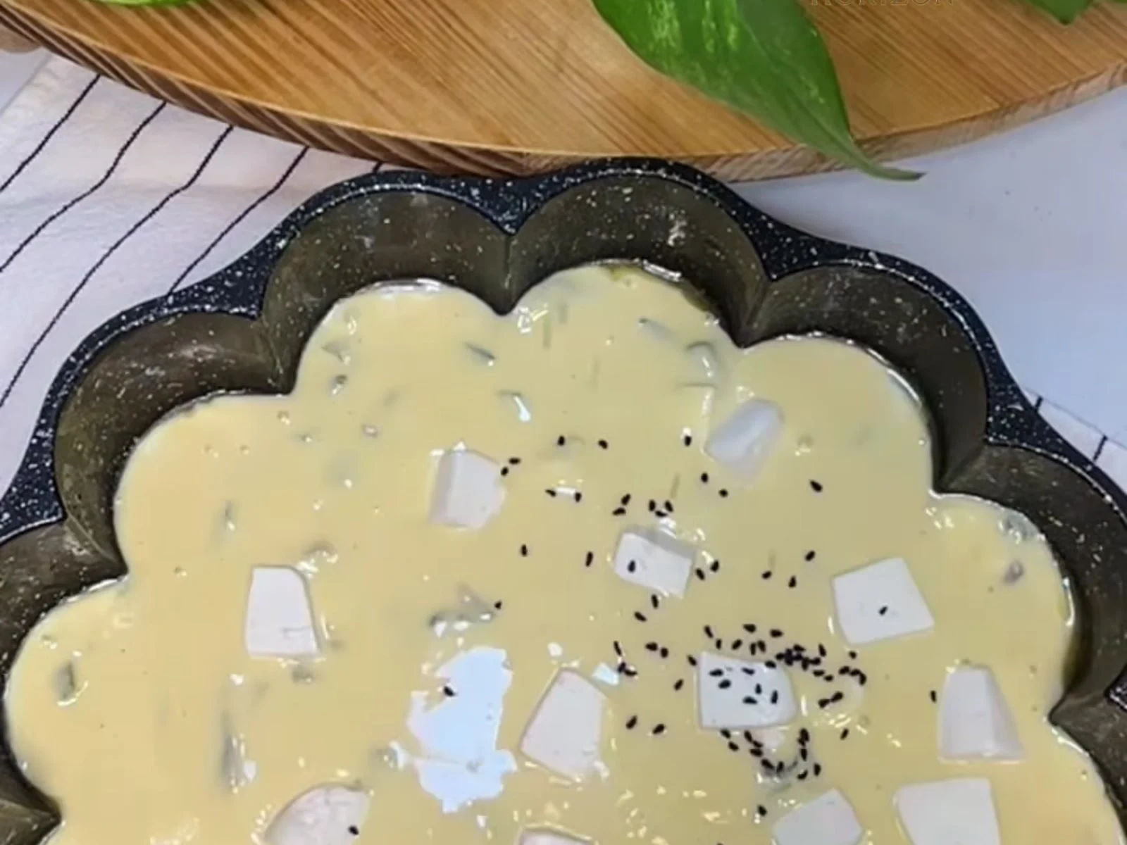 Scatter a few extra cheese cubes over the surface and
